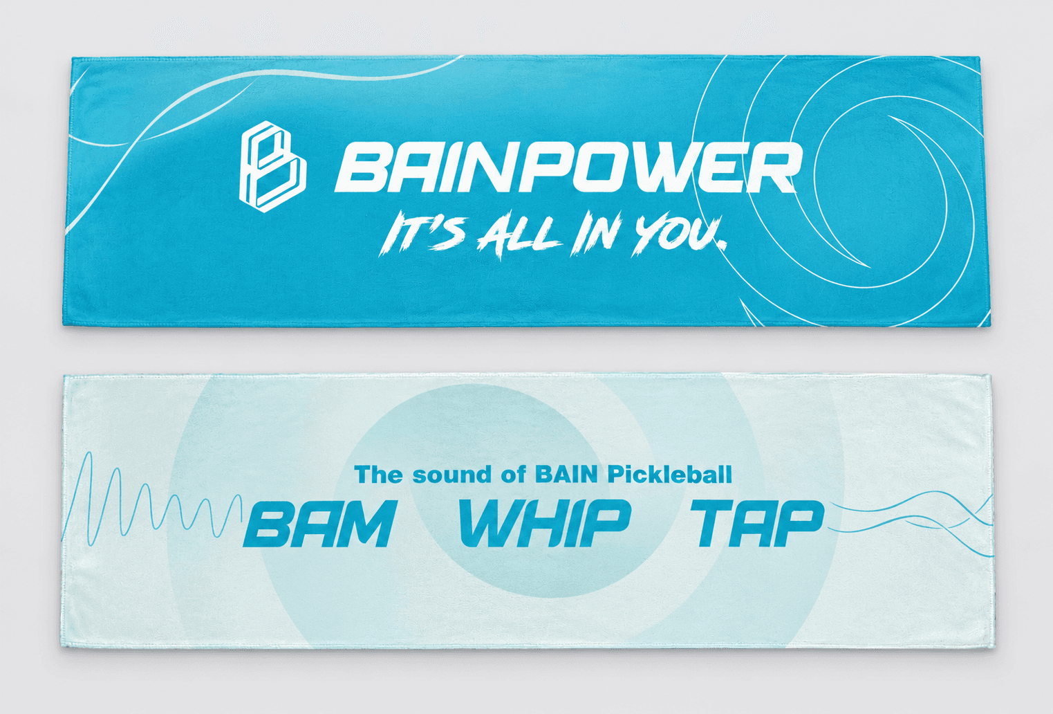 Front and back views of the BainPower microfibre towel